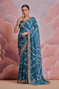 Teal georgette saree with multi-color coding sequence embroidery and matching blouse