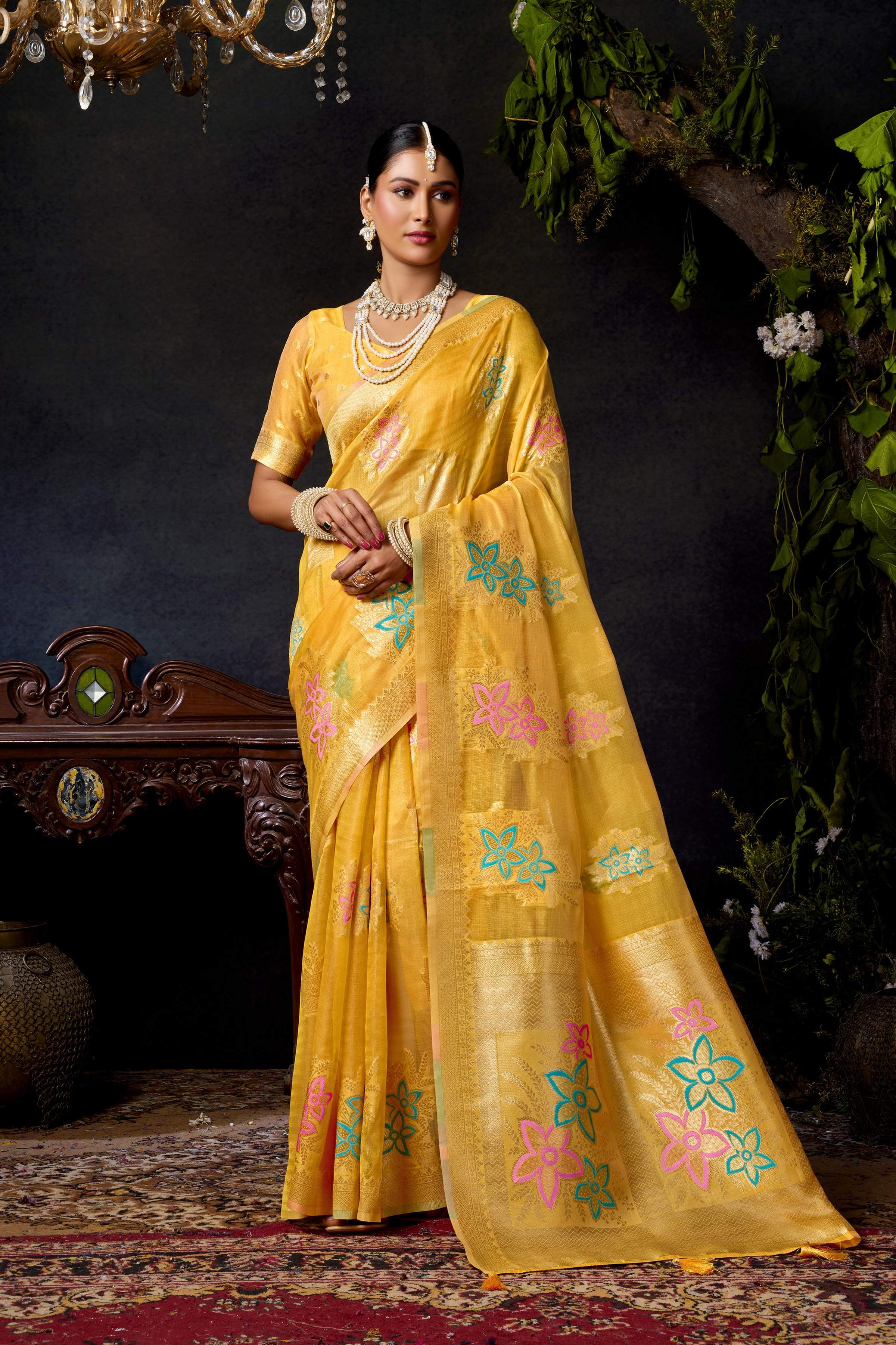 Yellow Organza Khadi saree with zari weaving and jhalar border detail