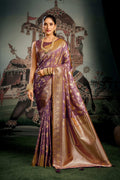 Wine colored soft silk saree with intricate gold zari woven border and jhalar detail