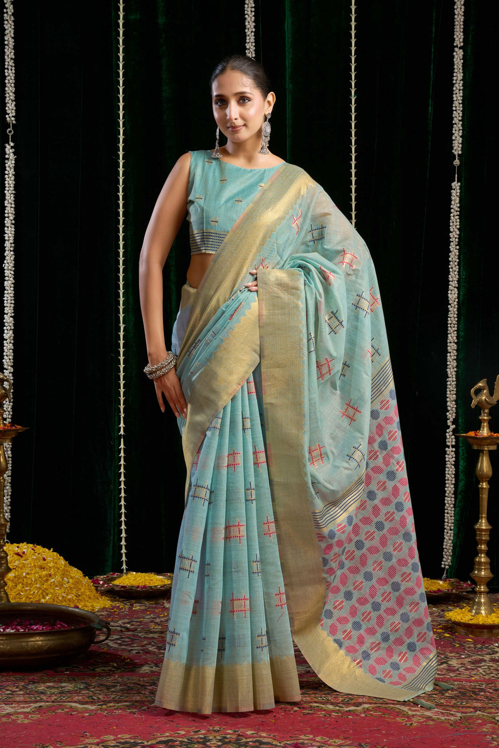 Turquoise soft spun cotton saree with zari woven borders