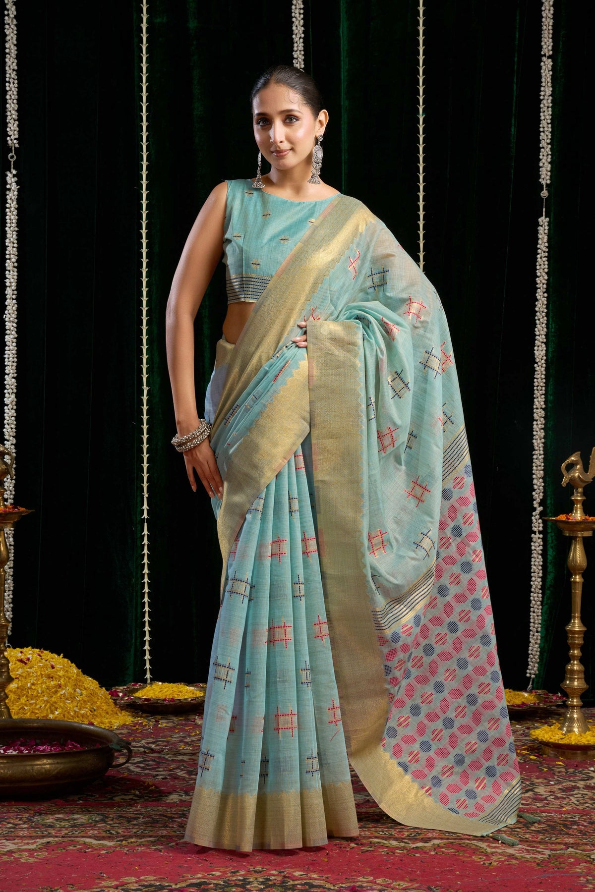 Turquoise soft spun cotton saree with zari woven borders