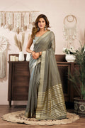 Grey Khadi cotton saree with intricate Zari woven border and Jhalar, includes blouse piece.