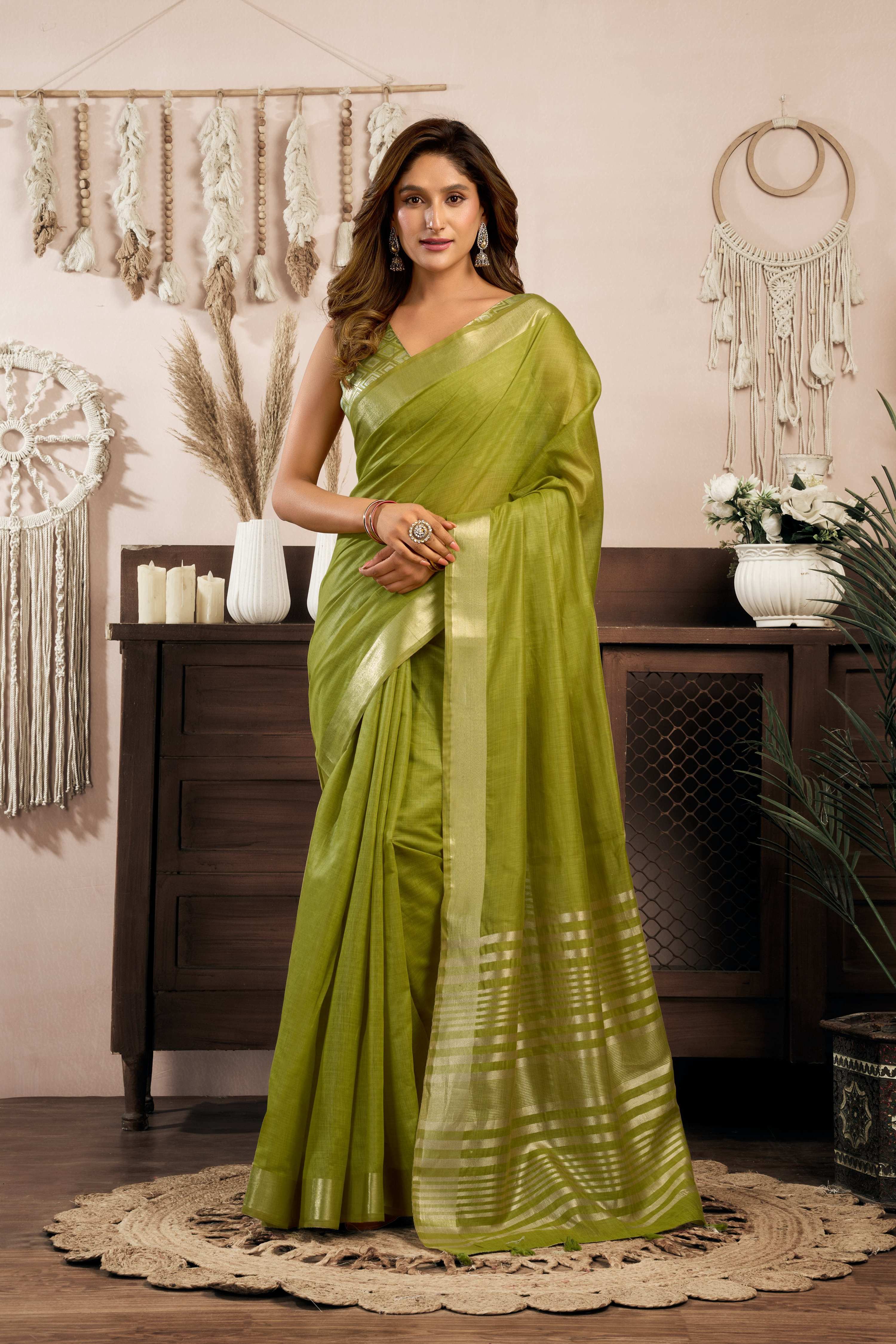 Green Khadi cotton saree with intricate zari weaving and matching blouse piece