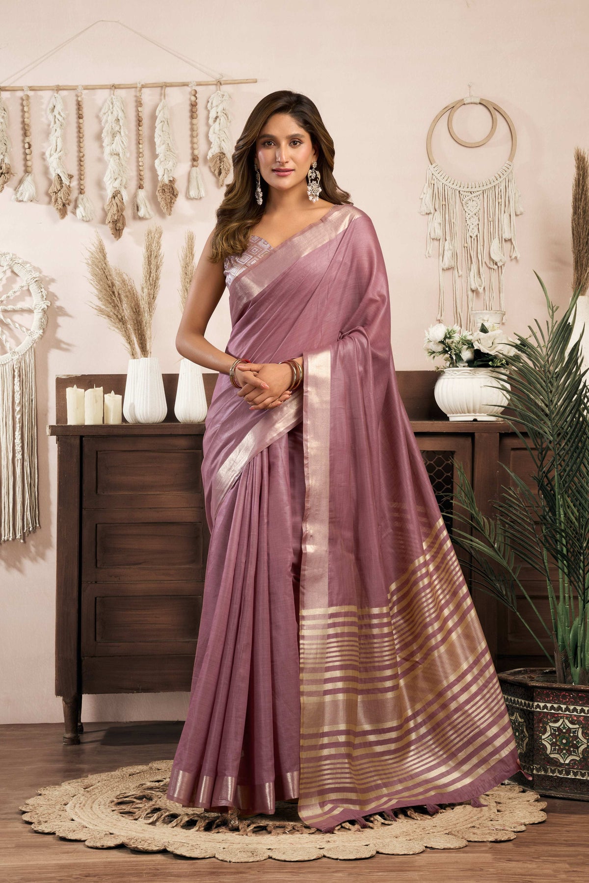 Wine colored khadi cotton saree featuring elegant zari woven borders