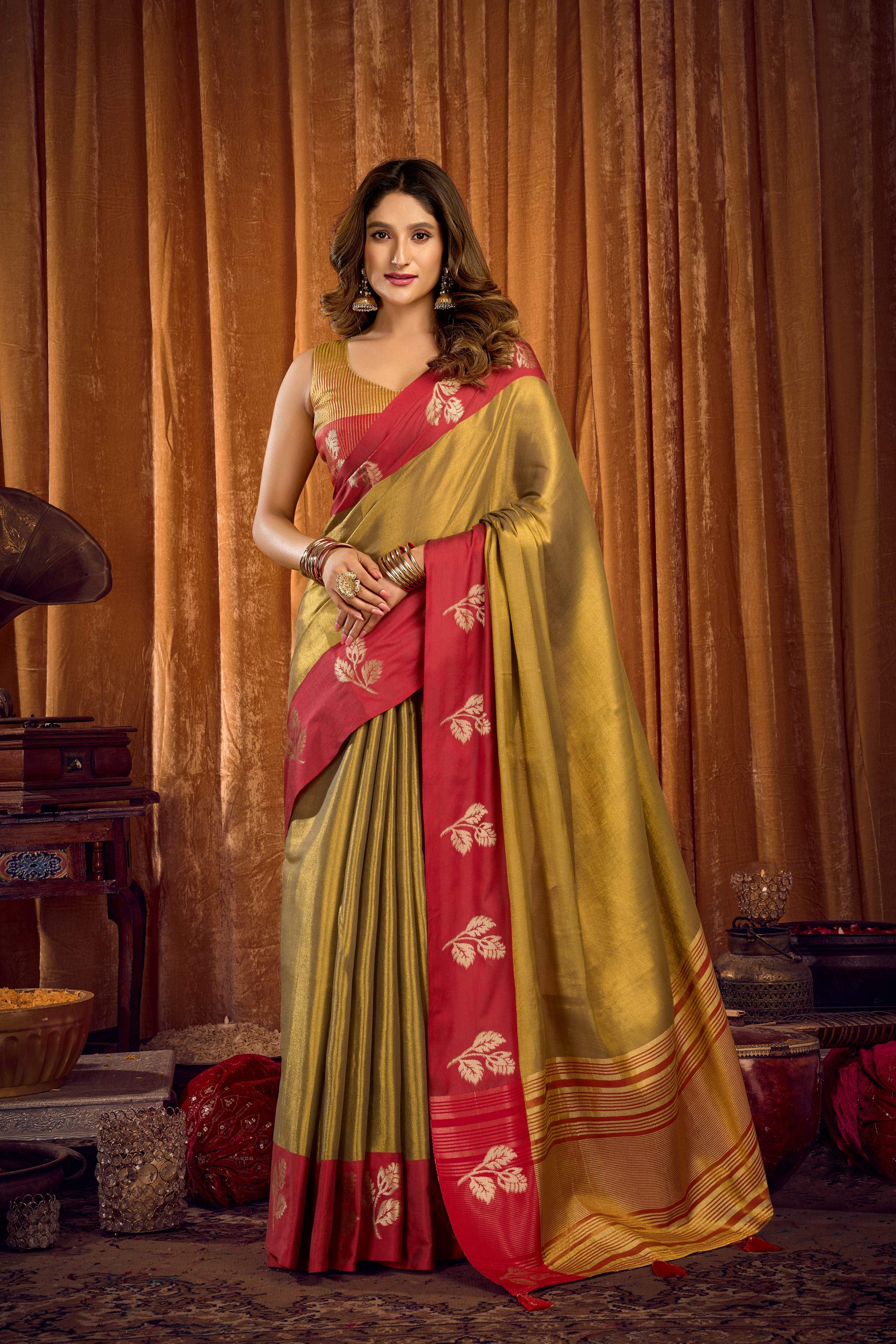 Mehendi soft tissue Zari woven saree featuring Jhalar work with matching blouse fabric