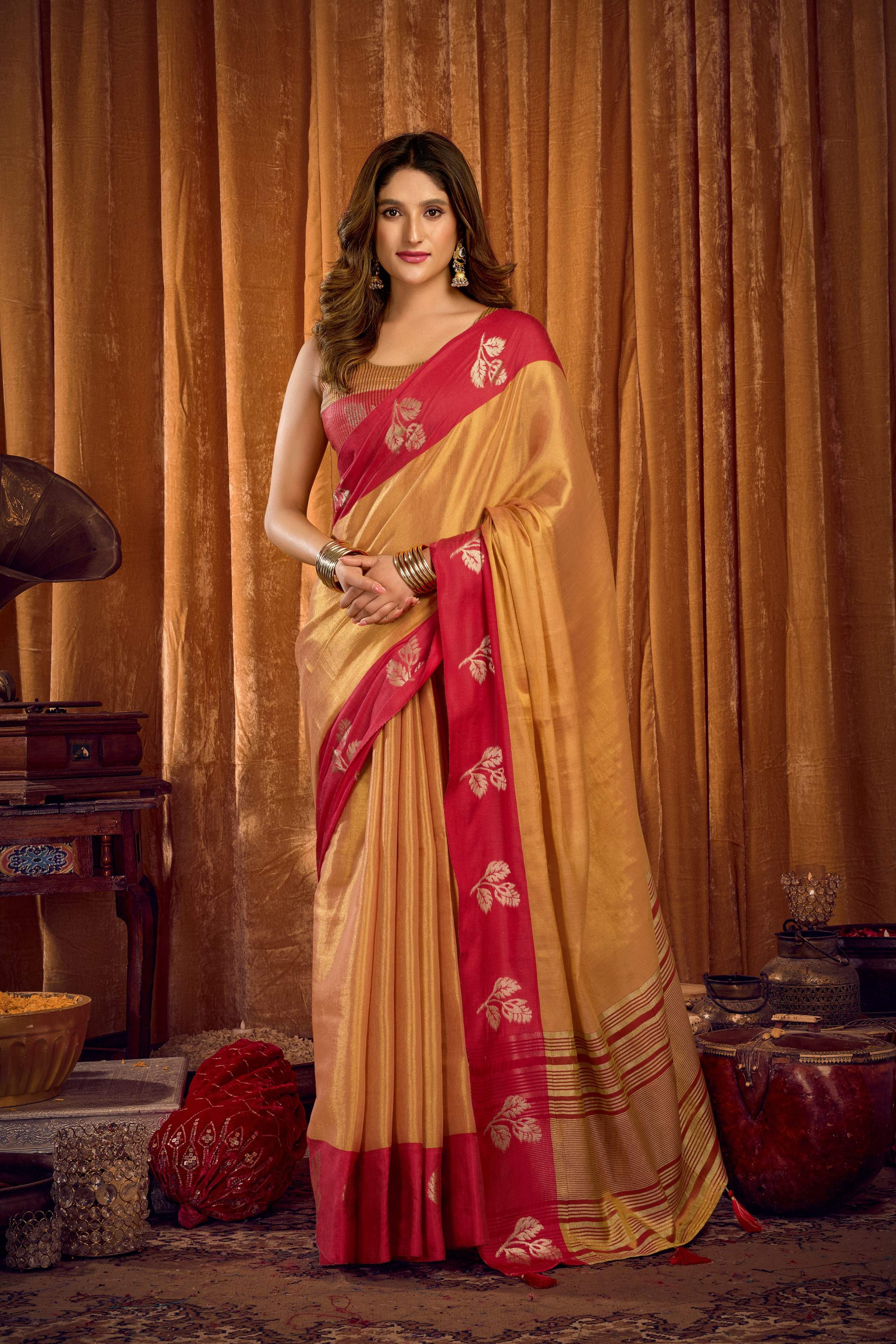 Beige soft tissue saree with gold zari weaving and jhalar border