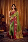 Green soft tissue saree with golden zari woven patterns