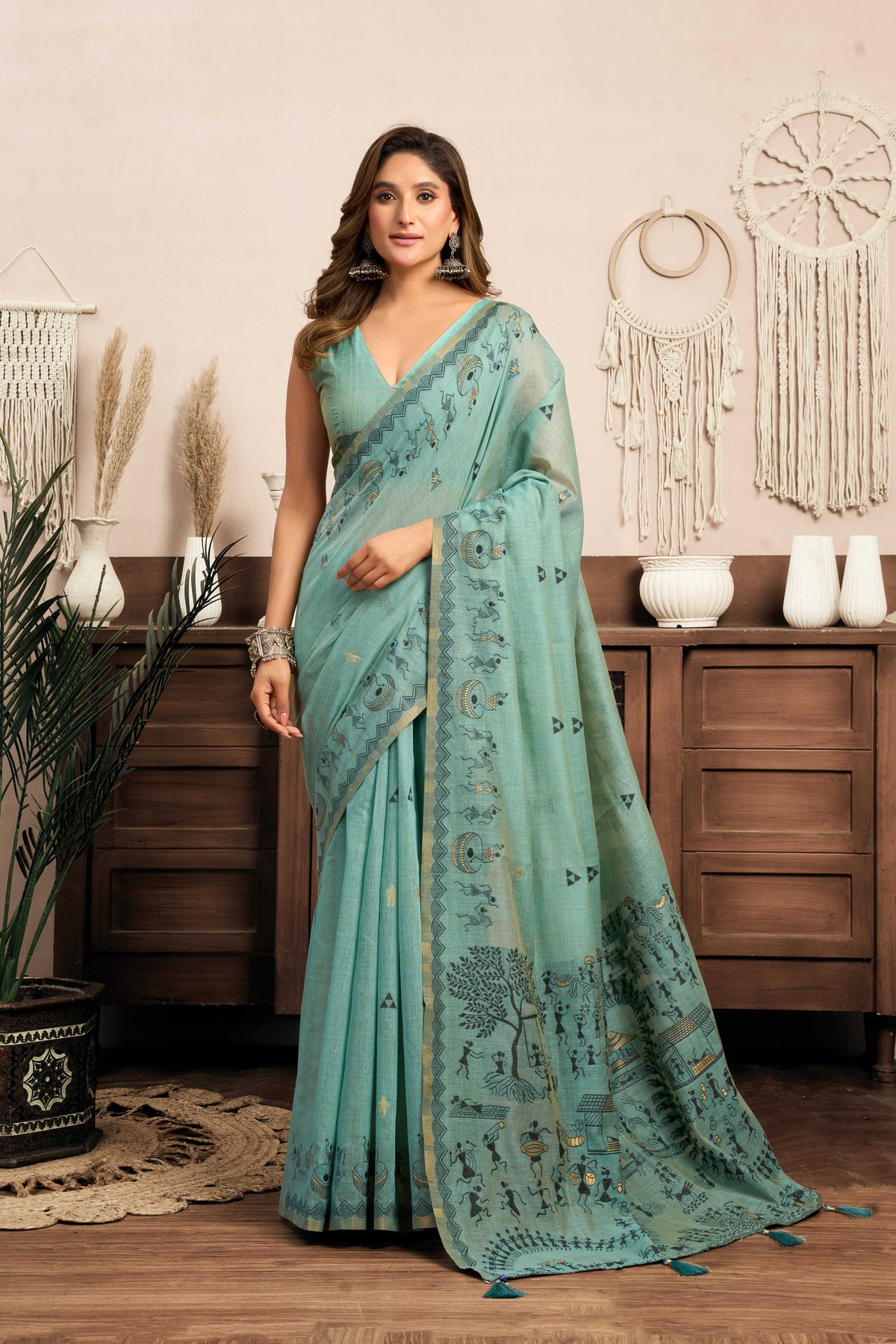 Sky Blue Modal Art Silk saree with traditional Warli work and Jhalar border
