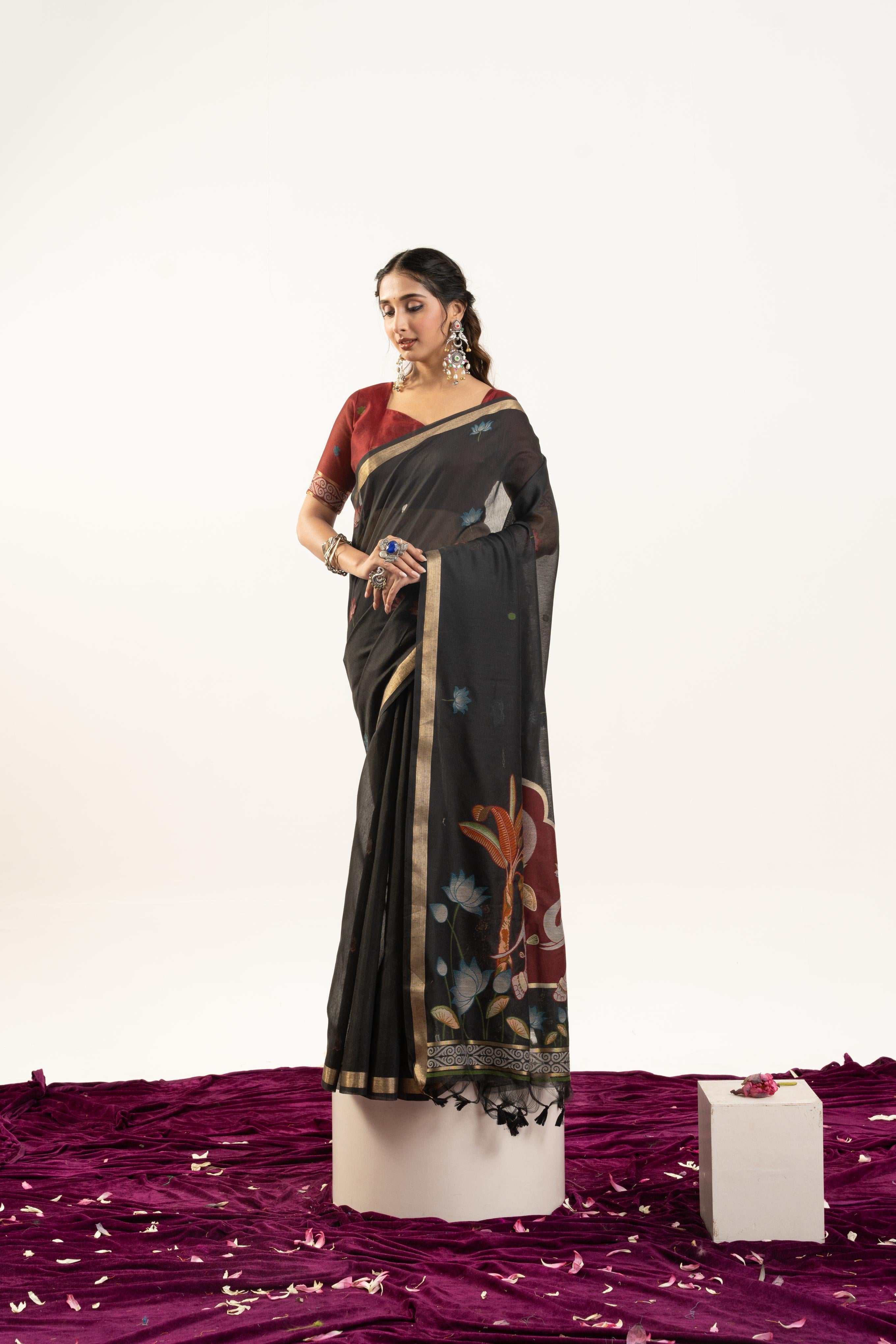 Black soft muga cotton saree with delicate zari woven butties