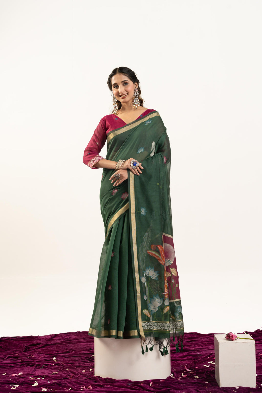 Bottle Green Muga Cotton saree with Zari woven butties and matching blouse