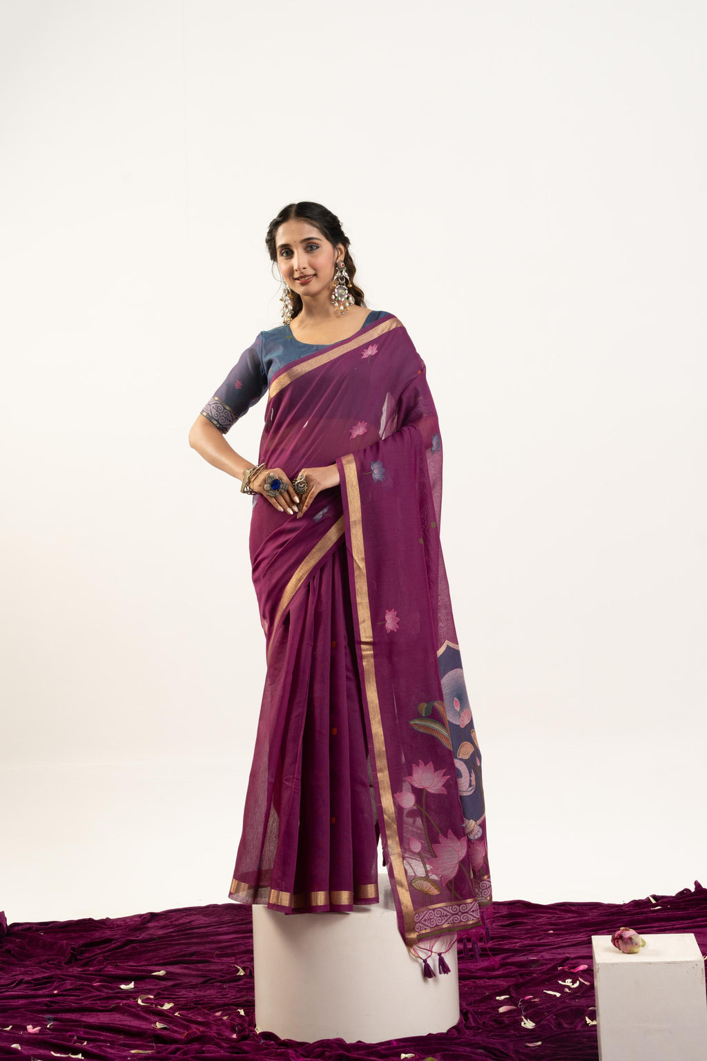 Wine colored soft Muga cotton saree with Zari woven butties and included blouse