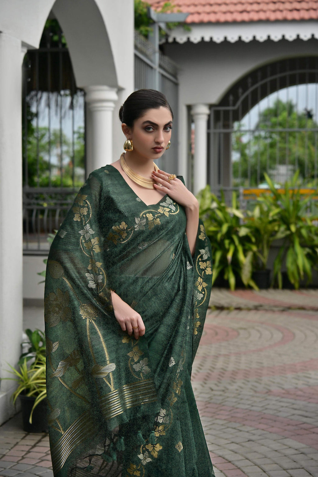 Bottle Green soft jute linen silk saree with intricate zari woven border and matching unstitched blouse piece