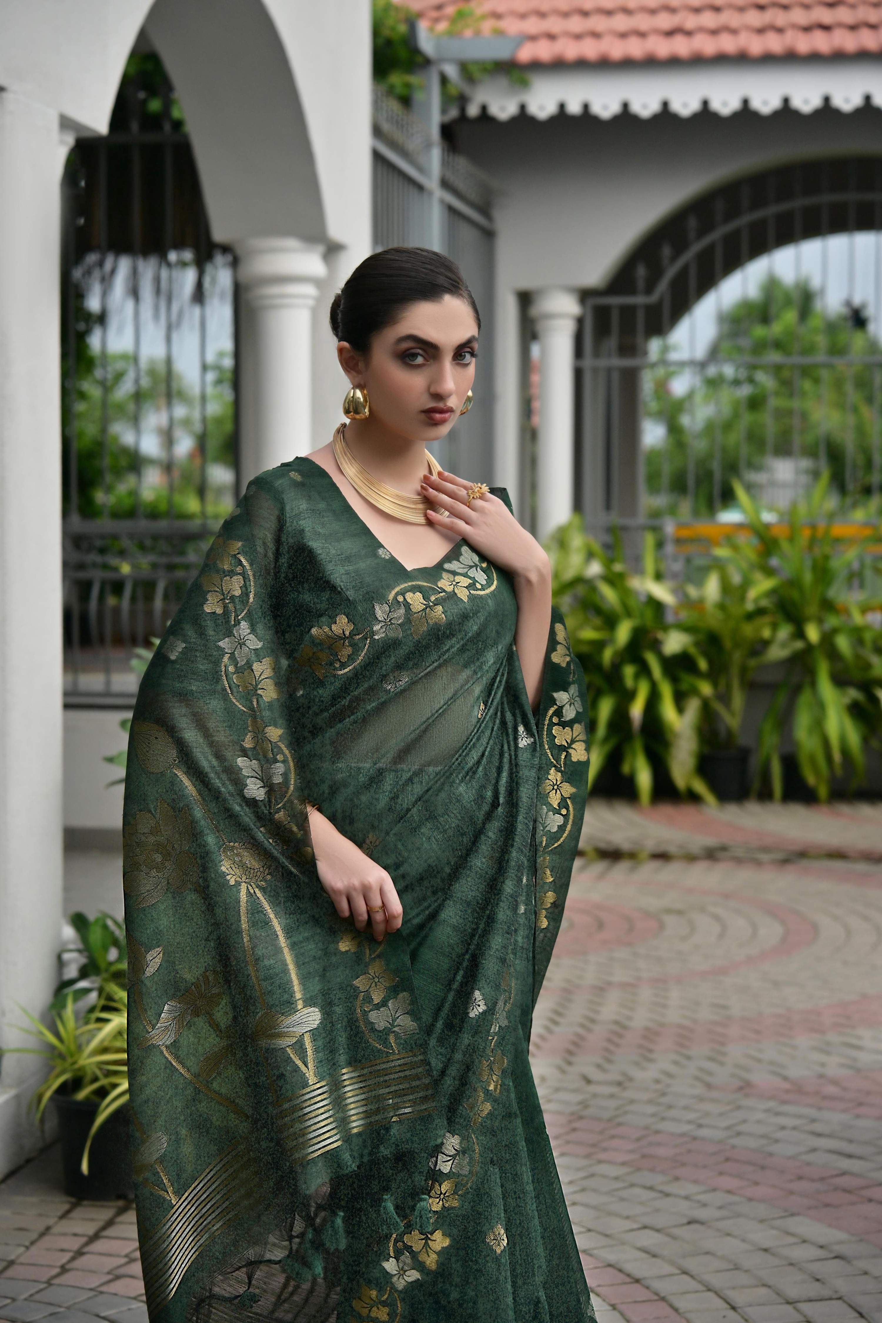 Bottle Green soft jute linen silk saree with intricate zari woven border and matching unstitched blouse piece