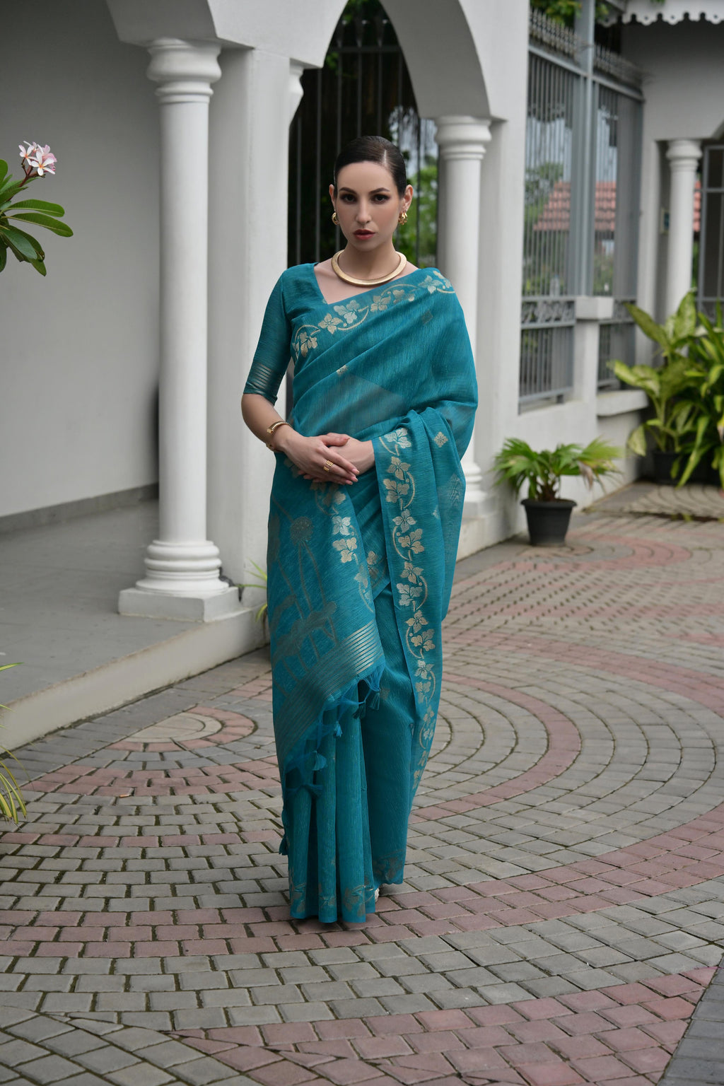 Firozi soft jute linen silk saree with zari woven border and matching blouse
