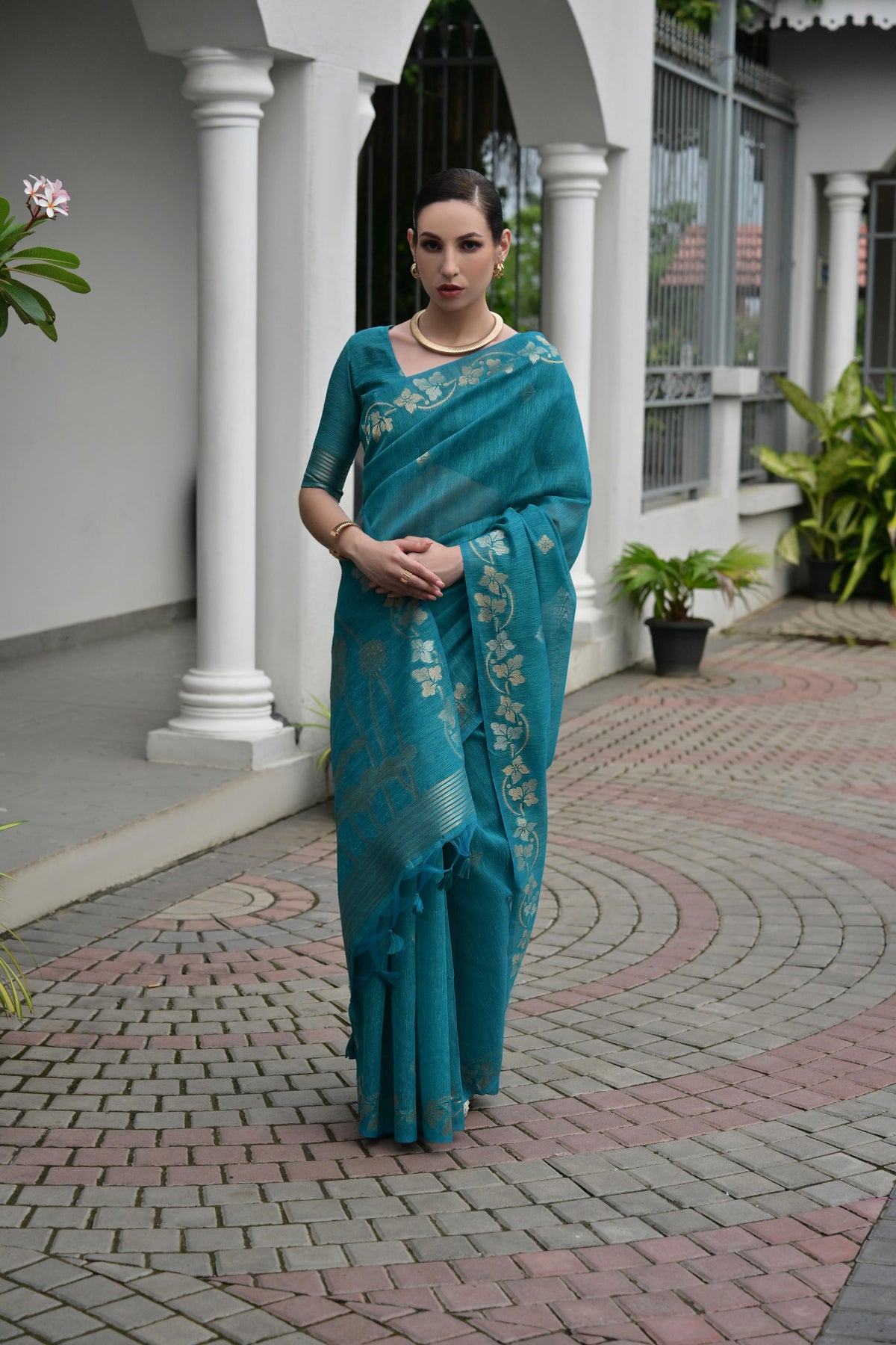 Firozi soft jute linen silk saree with zari woven border and matching blouse
