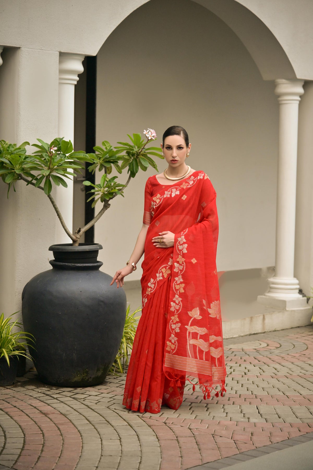 Red soft jute linen silk saree with elegant Zari weaving