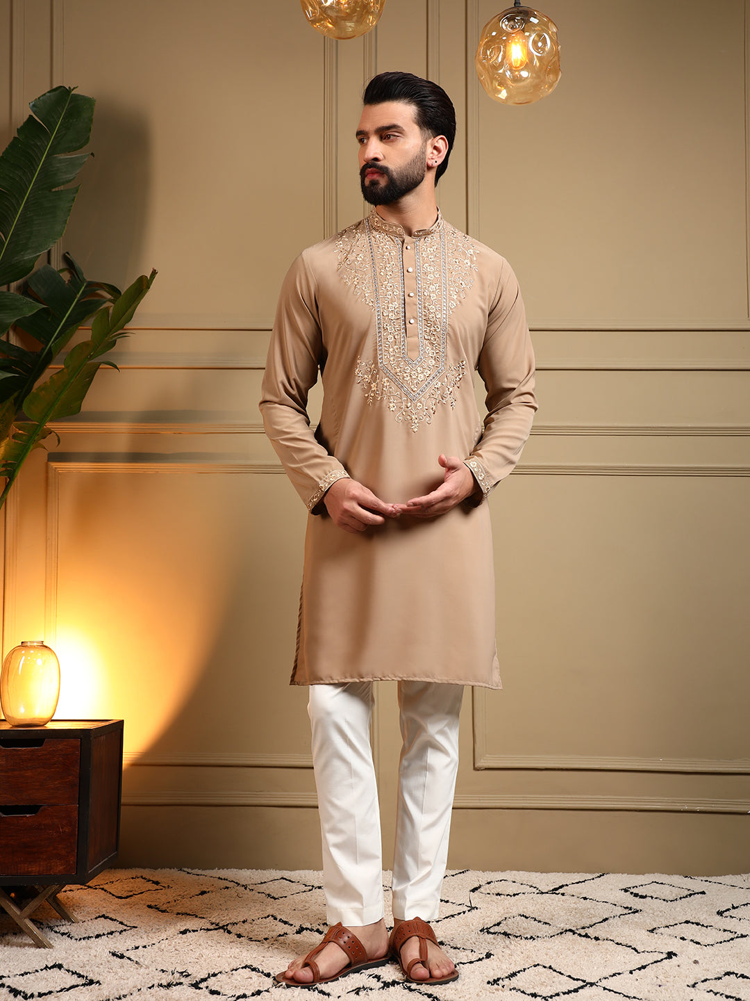 A beige Armani Lachka kurta with intricate sequins embroidery and matching pajama for kids.