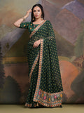 Bottle green georgette saree featuring detailed coding sequence work and matching blouse
