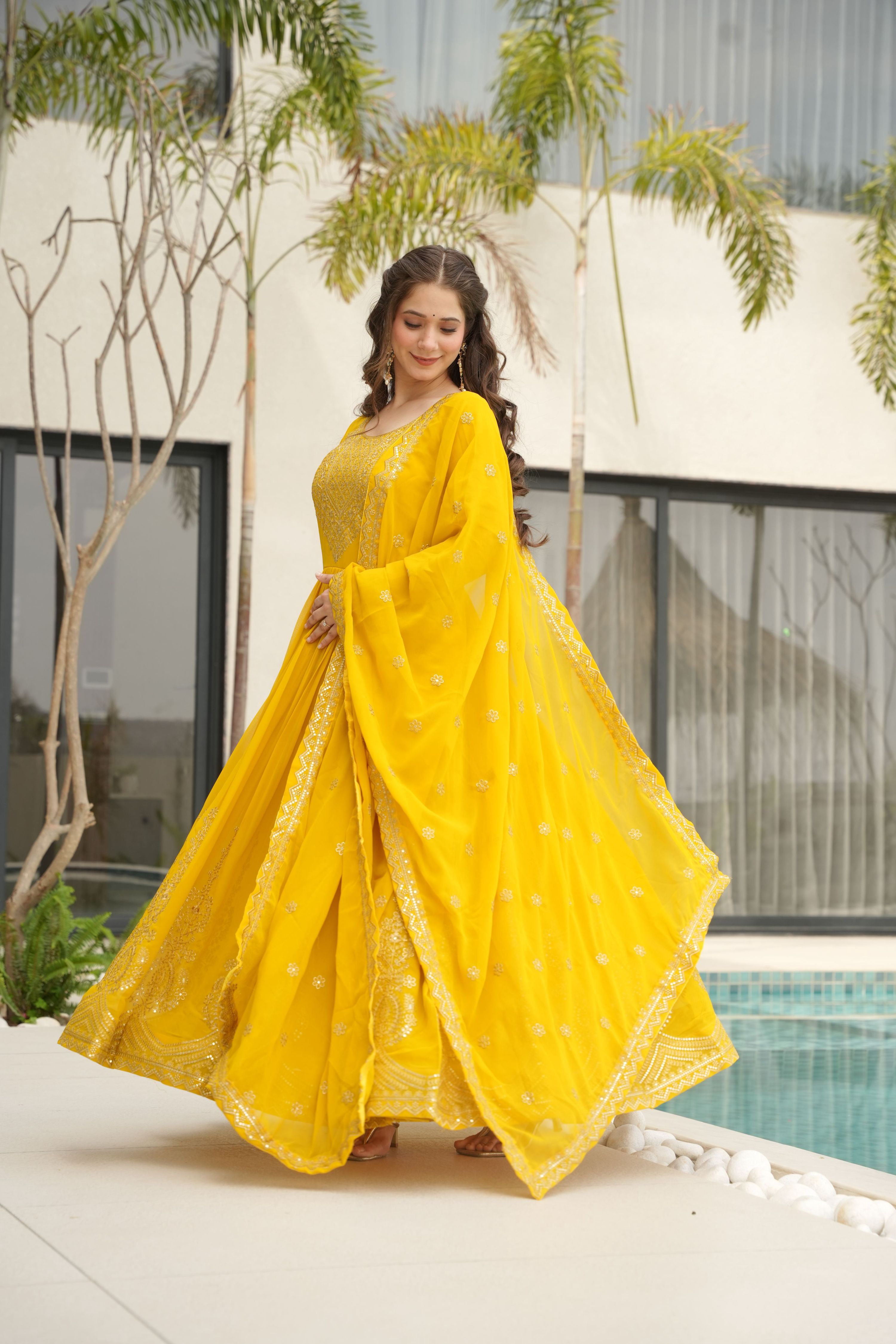 Yellow Faux Blooming Anarkali set with sequins work and matching dupatta