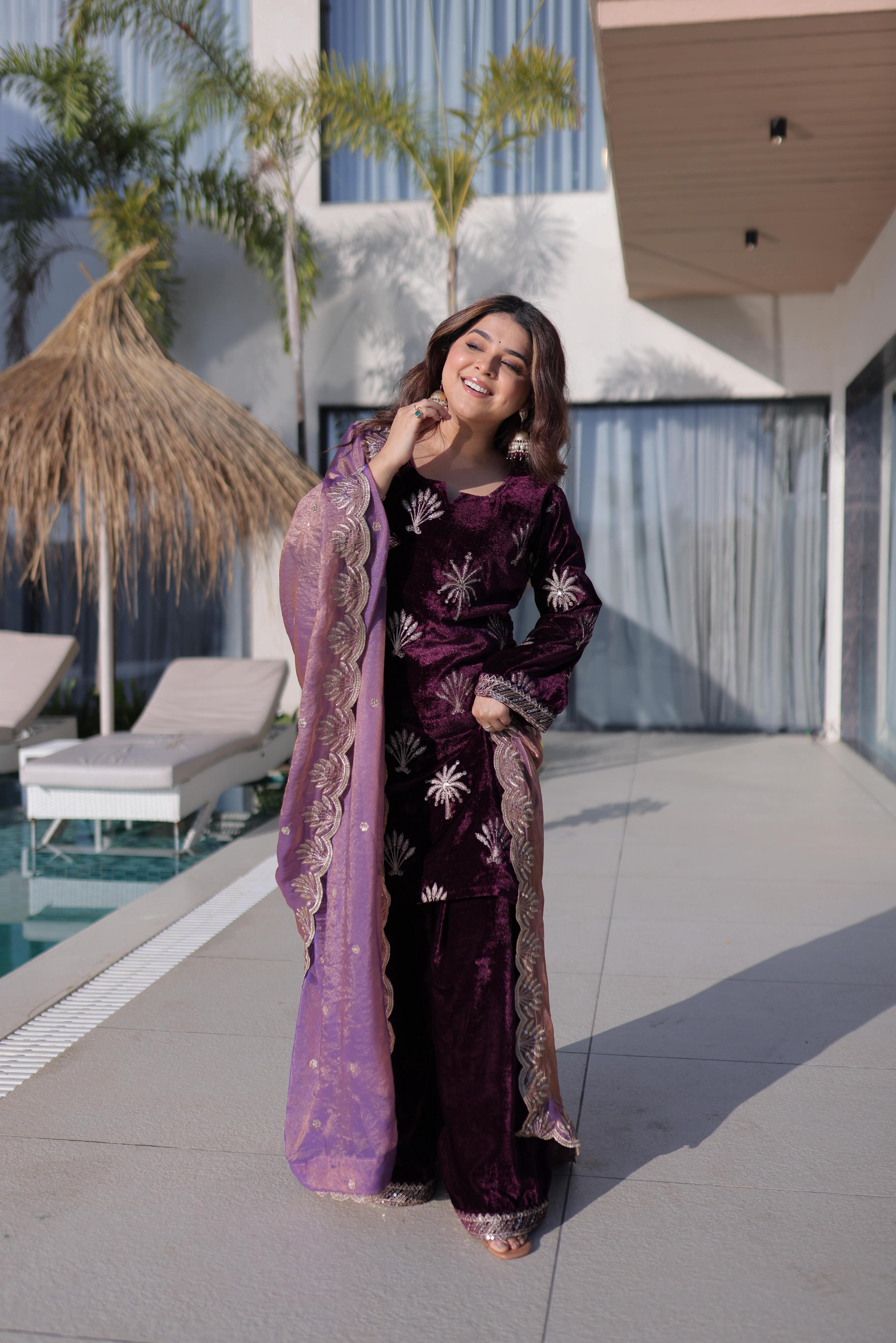Wine colored Ice Velvet kurta set with rich Zari embroidery and bell sleeves