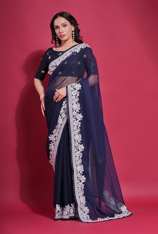 Navy blue georgette saree with intricate coding work and matching blouse