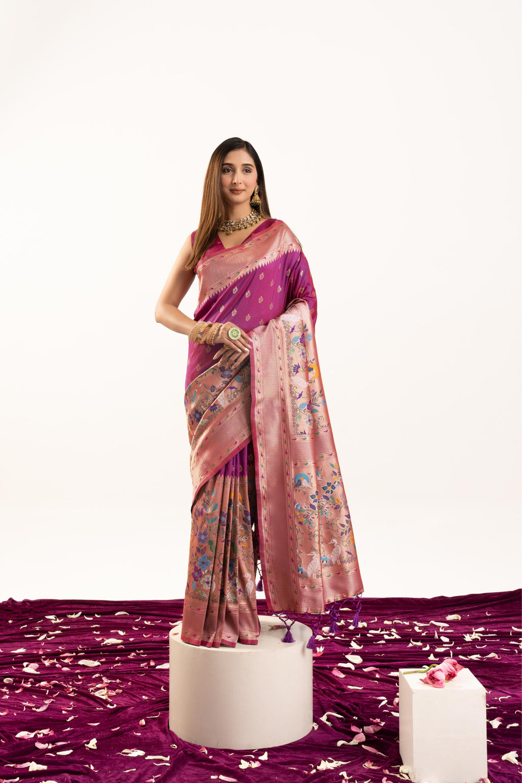Vibrant magenta soft Banarasi silk saree with Zari woven embroidery, including a matching blouse piece.