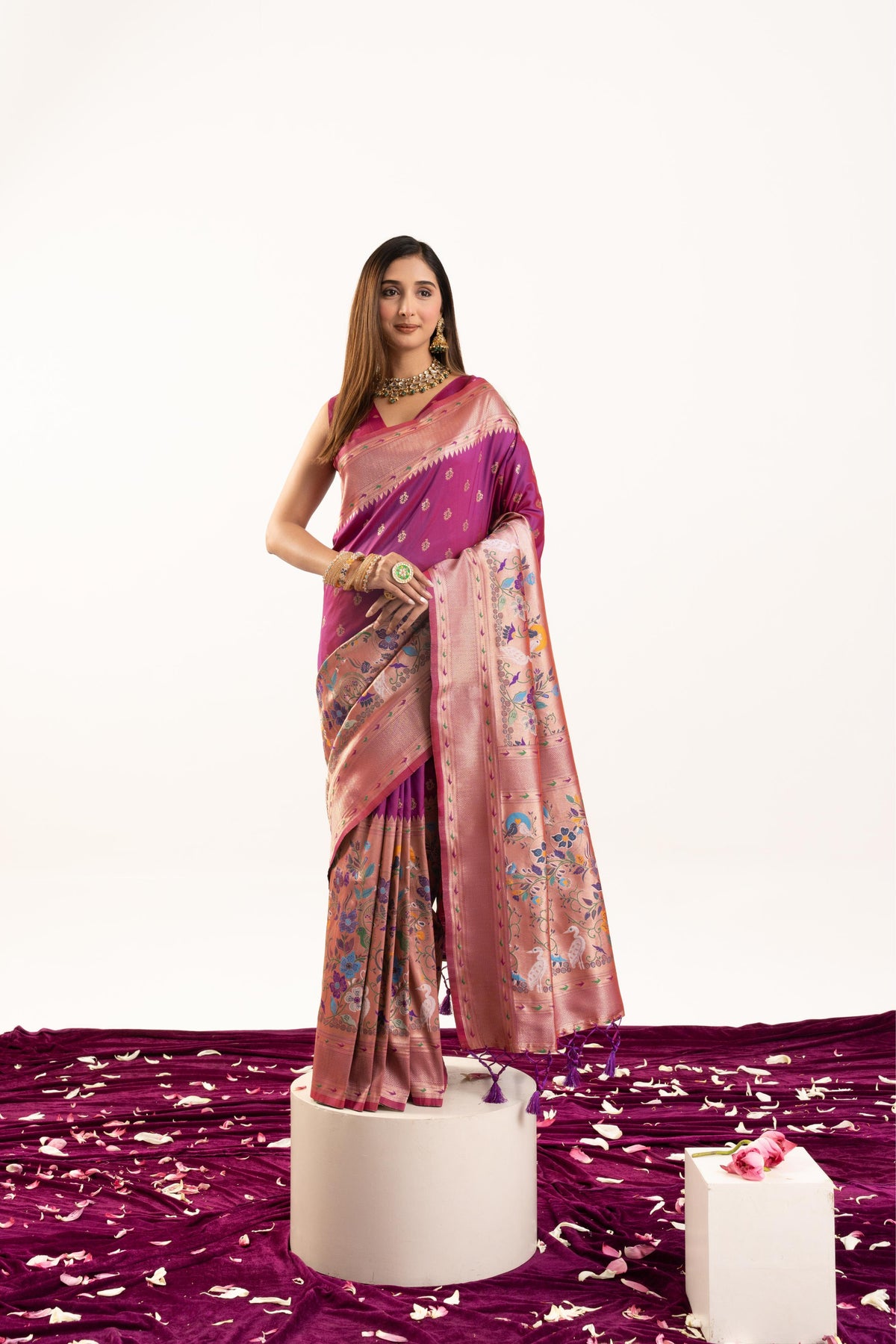 Vibrant magenta soft Banarasi silk saree with Zari woven embroidery, including a matching blouse piece.