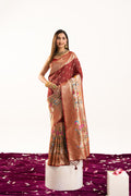 Maroon soft Banarasi silk saree with intricate zari weaving