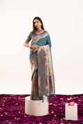 Rama colored soft Banarasi silk saree with gold zari border and blouse piece.
