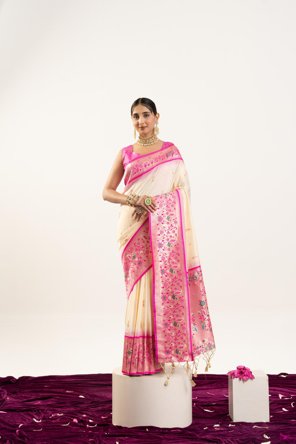 Classic cream soft Banarasi silk saree with a refined Zari woven border, including a blouse piece.