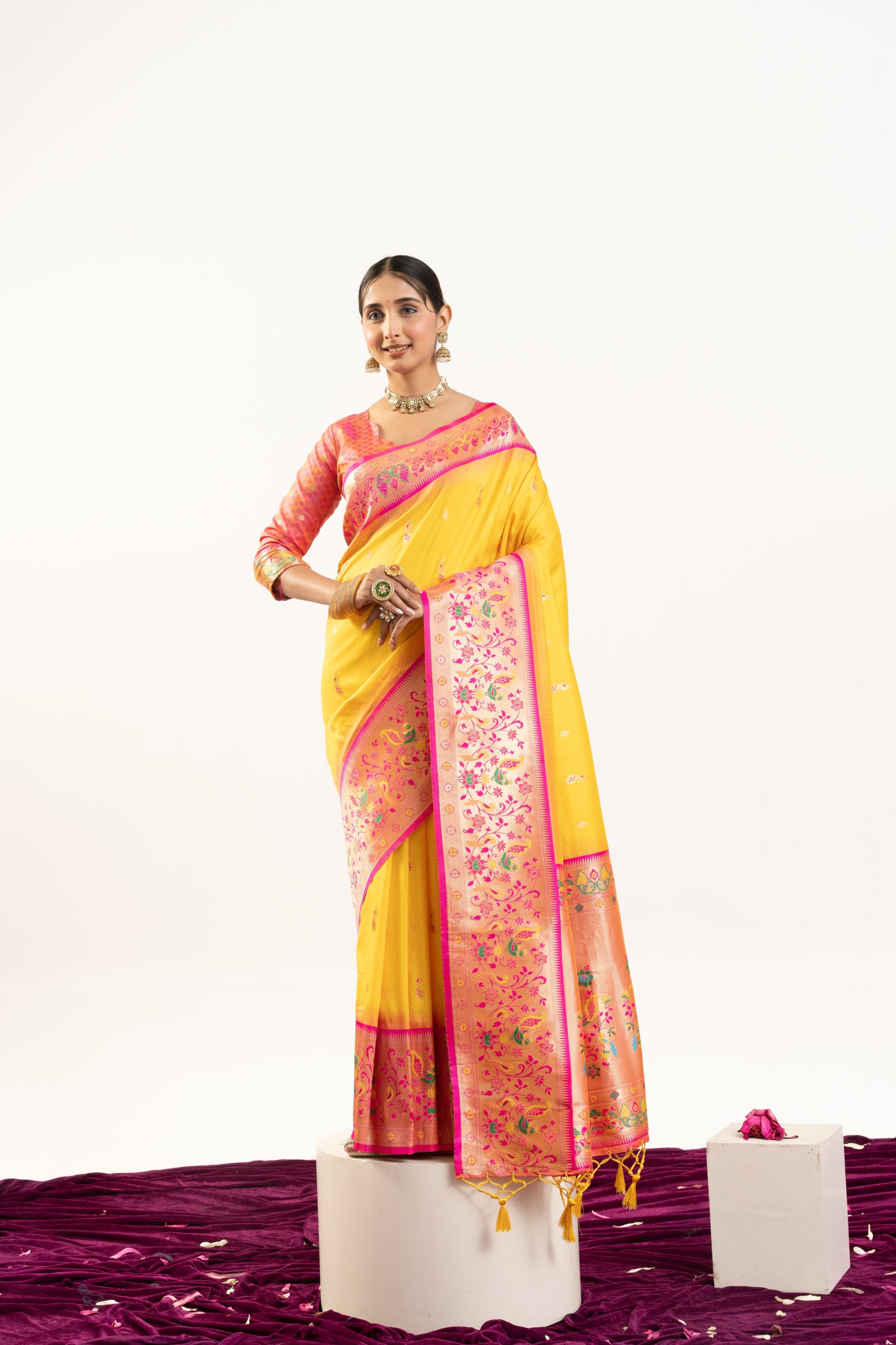 Yellow soft Banarasi silk saree with traditional zari woven border and matching blouse