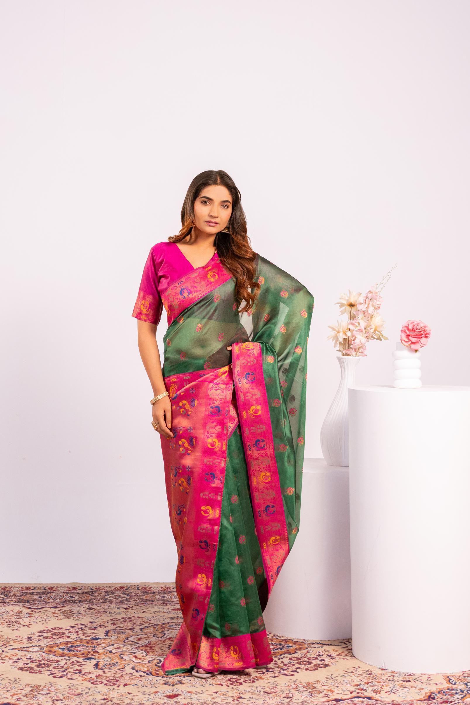 Green Soft Tissue Silk Saree with Zari Woven Detail and Blouse