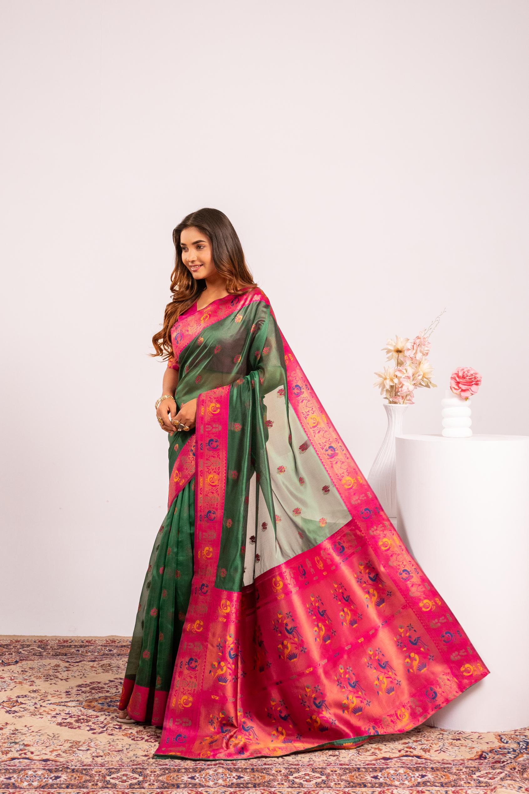 Green Soft Tissue Silk Saree with Zari Woven Detail and Blouse