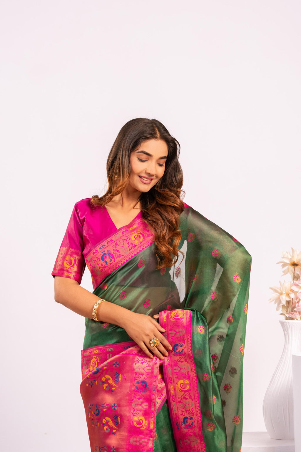 Green Soft Tissue Silk Saree with Zari Woven Detail and Blouse