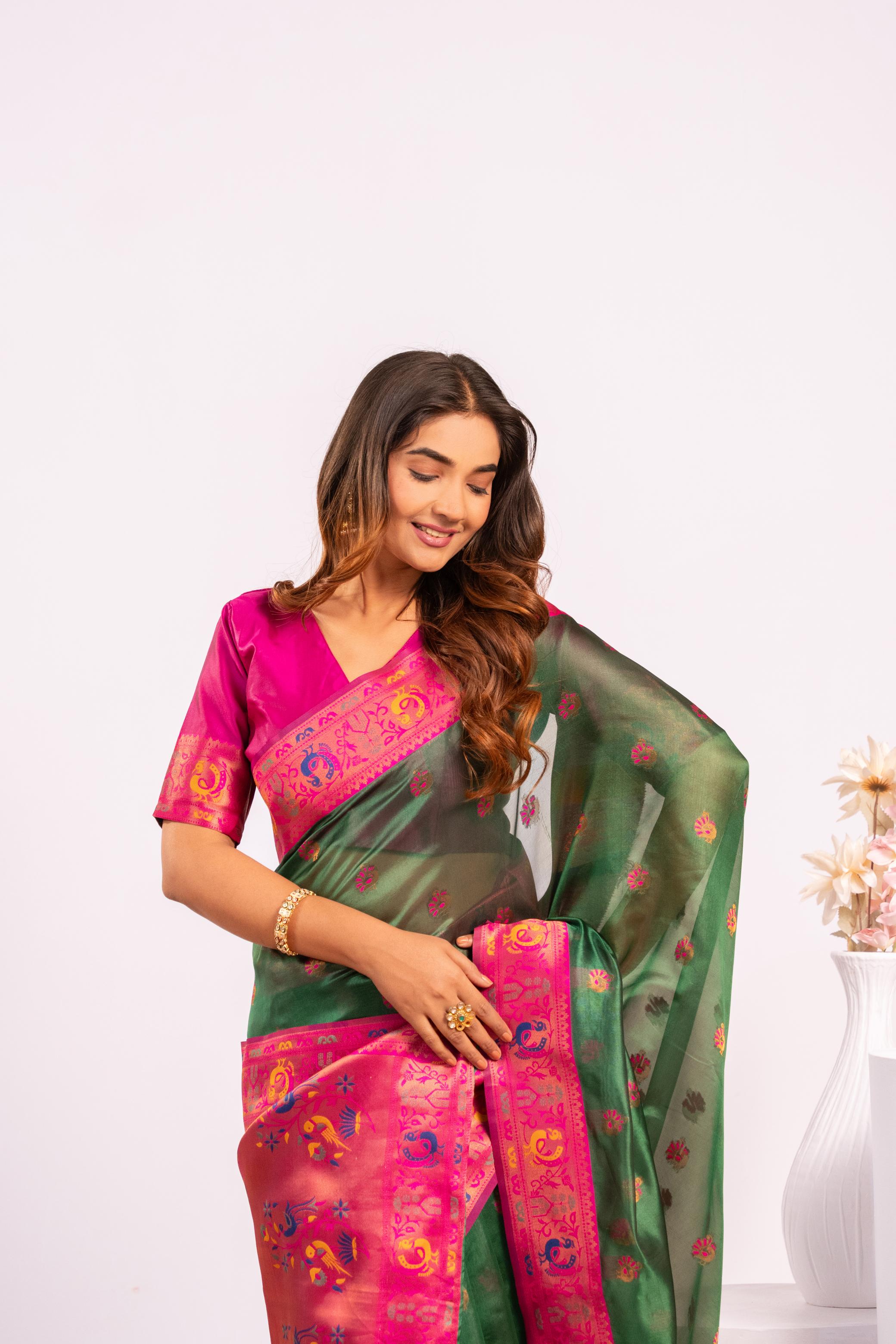 Green Soft Tissue Silk Saree with Zari Woven Detail and Blouse