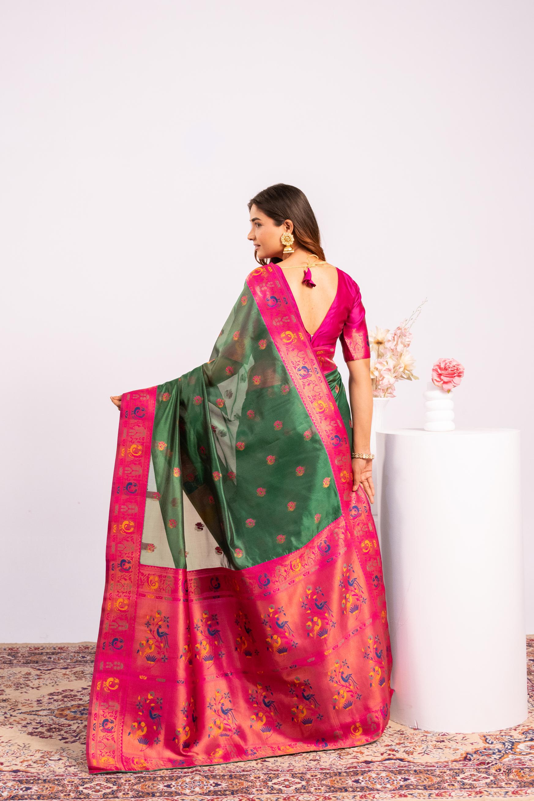 Green Soft Tissue Silk Saree with Zari Woven Detail and Blouse