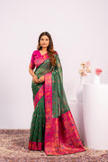 Green Soft Tissue Silk saree with delicate Zari woven patterns