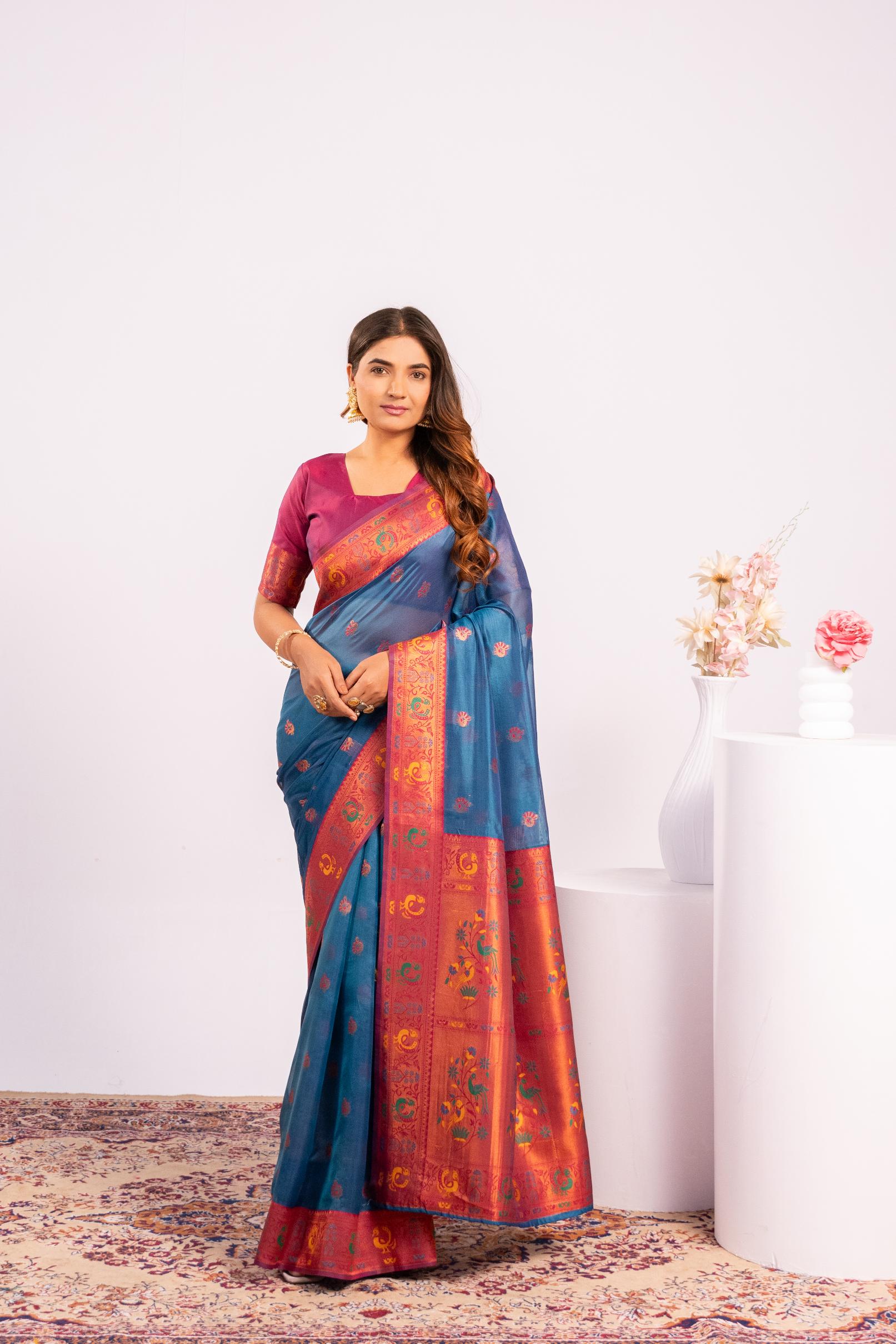 Rama color soft tissue silk saree with traditional zari woven border