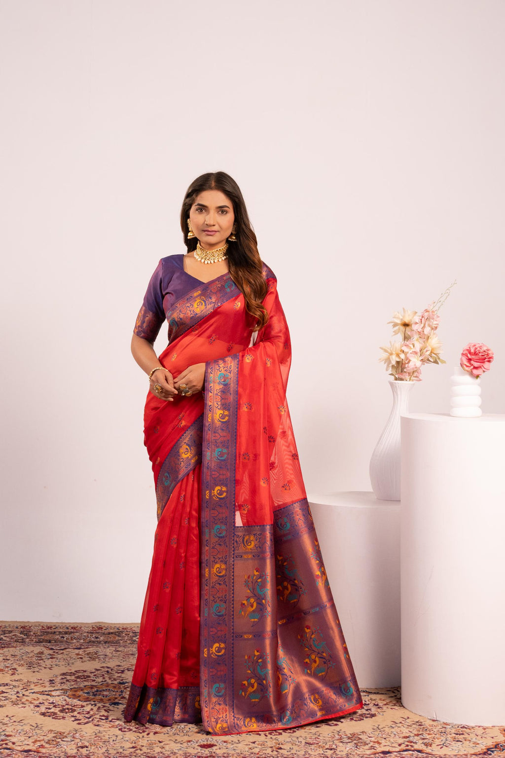Red soft tissue silk saree with intricate Zari woven patterns