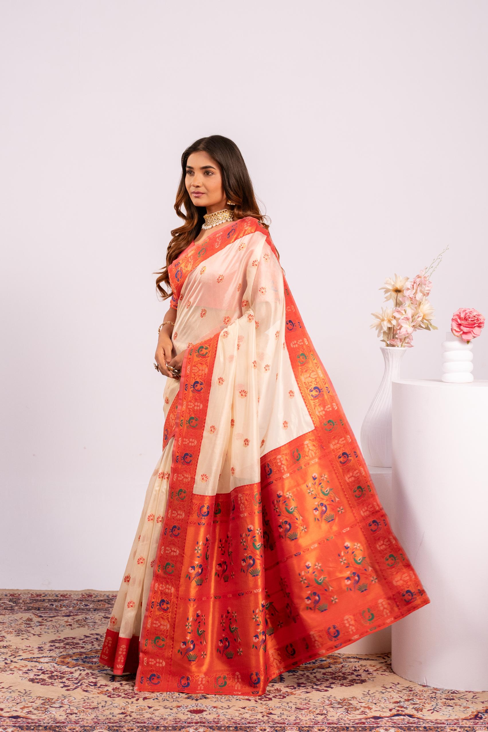 White Soft Tissue Silk Zari Woven Saree with Blouse