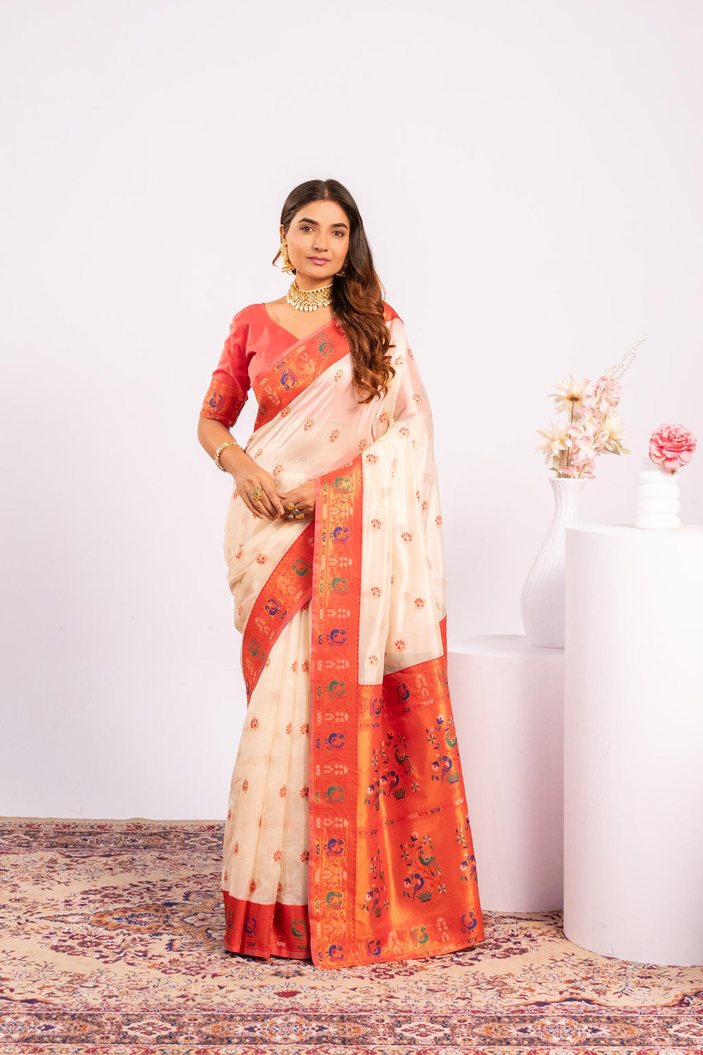 White soft tissue silk saree with intricate gold Zari weaving