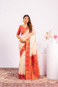 White soft tissue silk saree with intricate gold Zari weaving