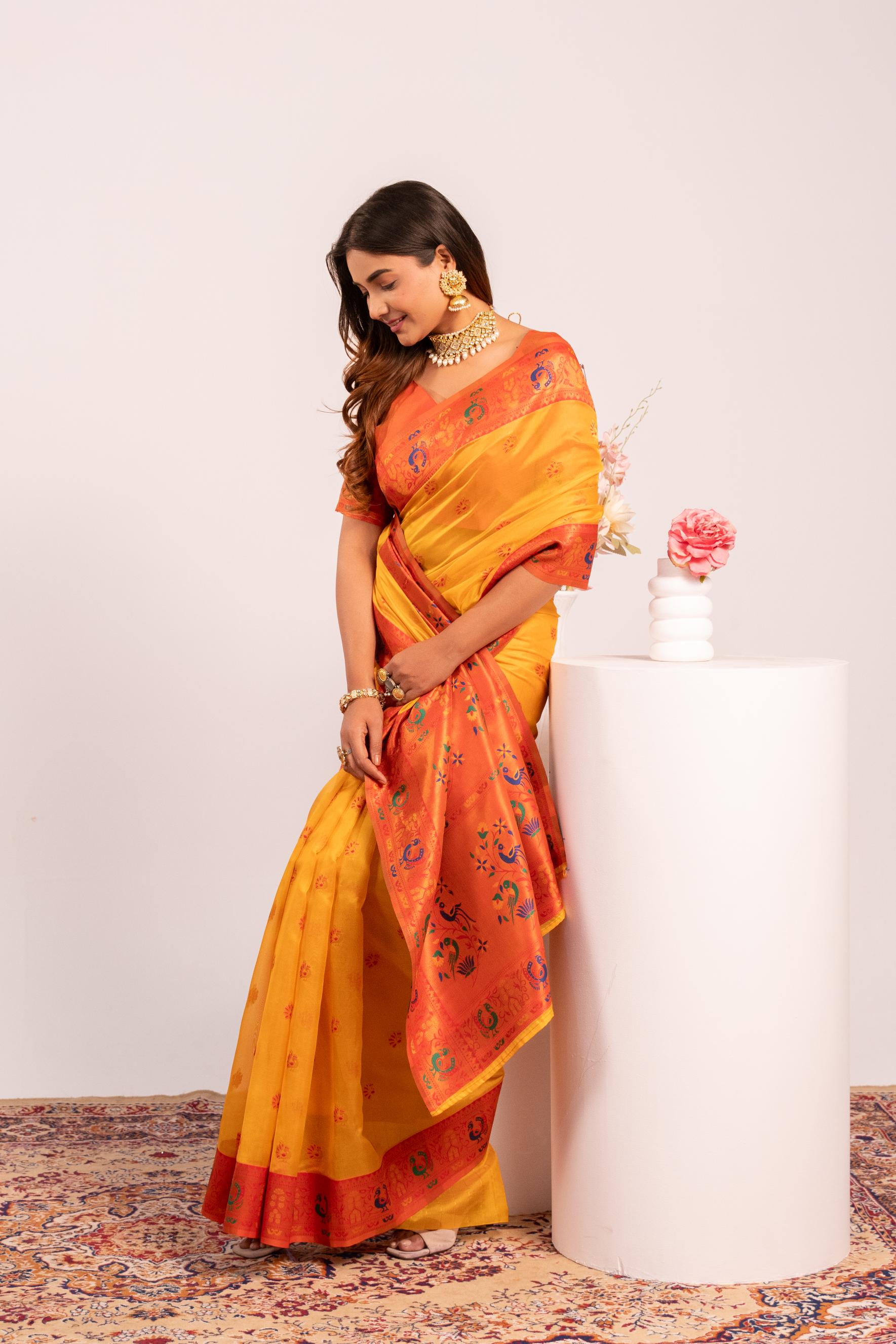Yellow Soft Tissue Silk Zari Woven Saree with Matching Blouse