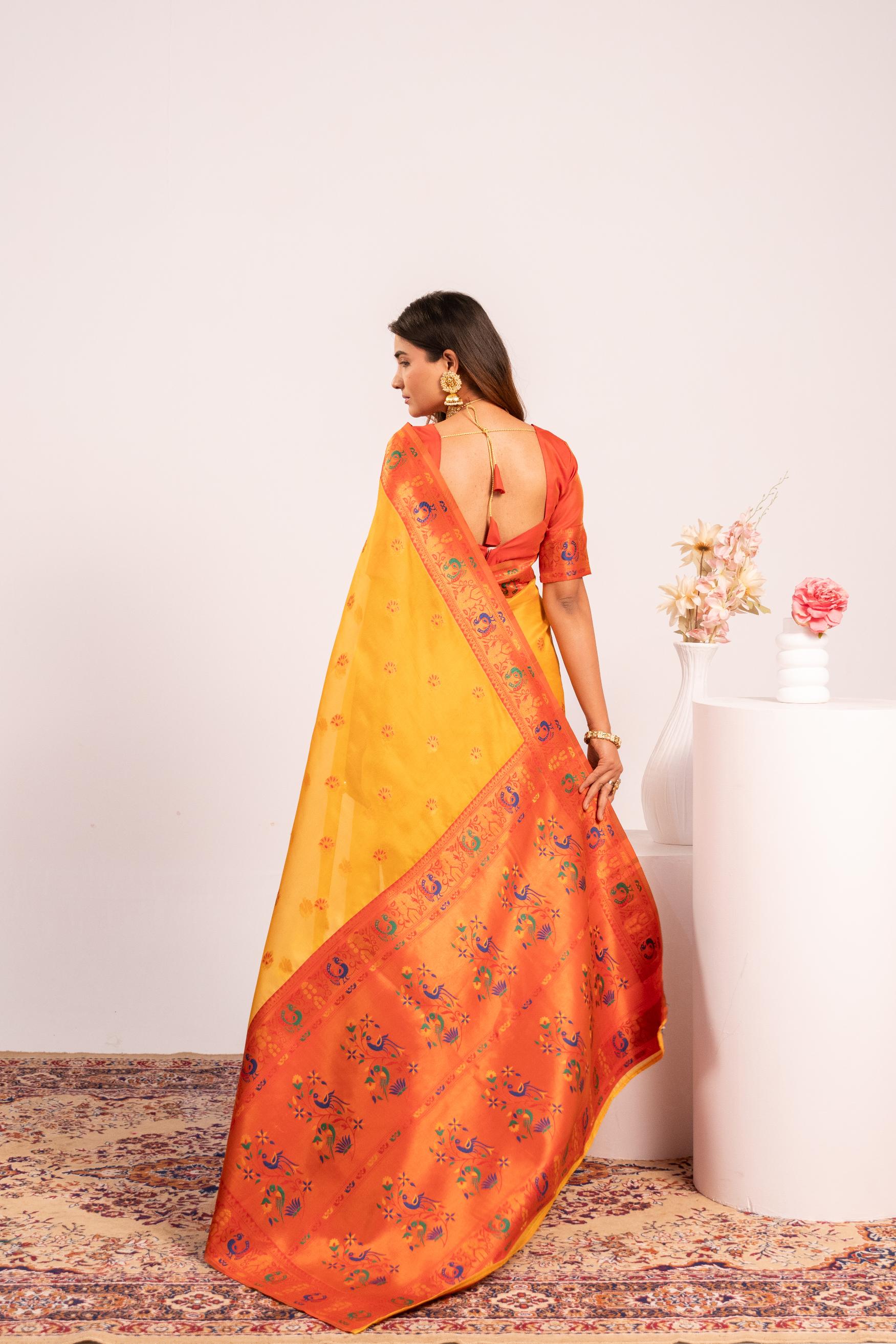 Yellow Soft Tissue Silk Zari Woven Saree with Matching Blouse