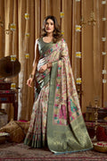 Sea green Banarasi saree with digital cluster prints and tassel details
