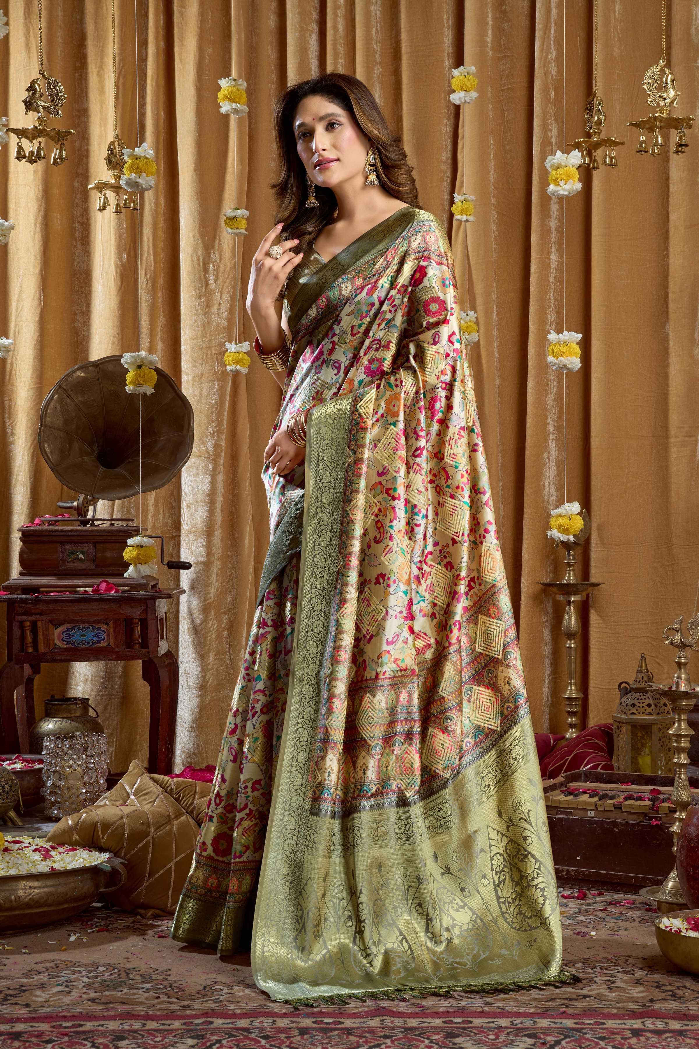 Green Banarasi saree featuring a unique digital cluster print and decorative tassels, includes blouse.