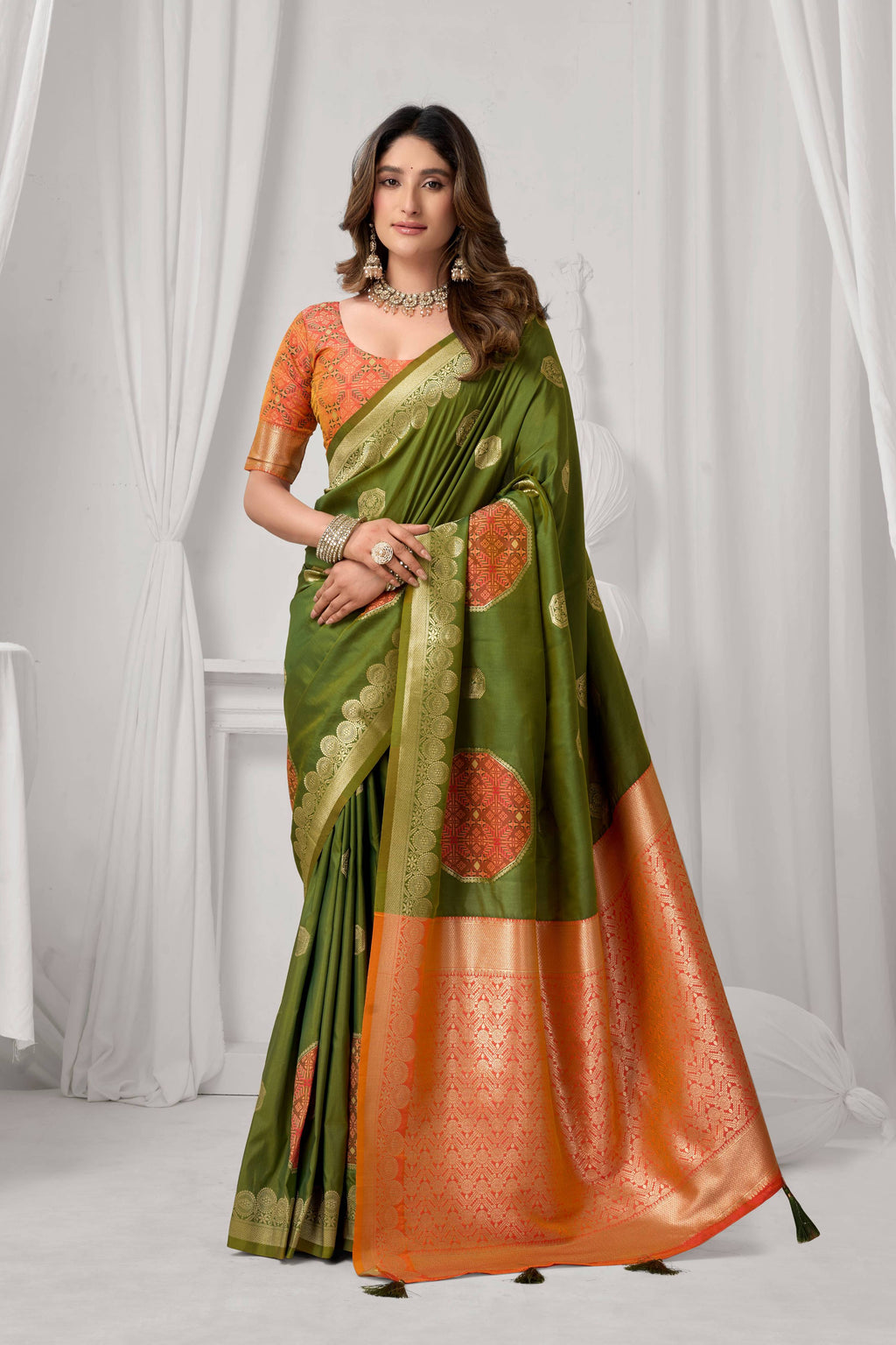 Classic green soft silk saree with intricate Zari woven border