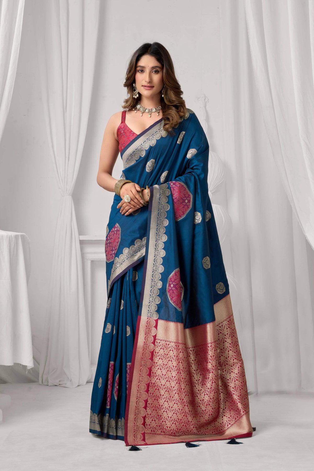 Blue soft silk saree with zari woven borders and matching blouse
