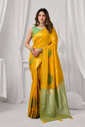 Yellow soft silk saree with gold Zari weaving and matching blouse