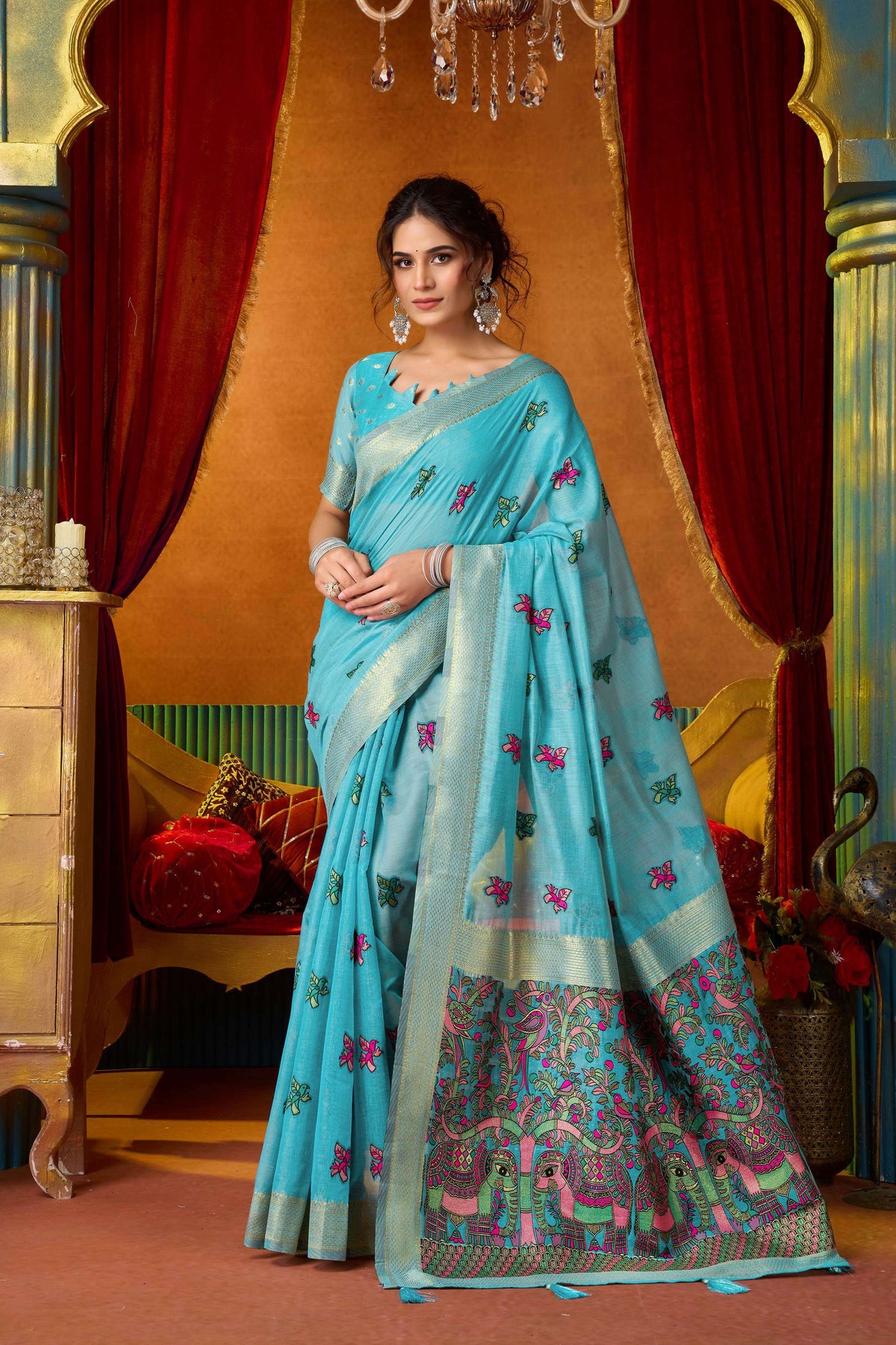 Turquoise Modal saree with intricate Zari woven patterns and matching unstitched blouse piece